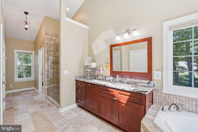 1340 Mountain View Rd, Stafford, VA 22554 - full bathroom featuring double vanity, a stall shower, lofted ceiling, and a bath
