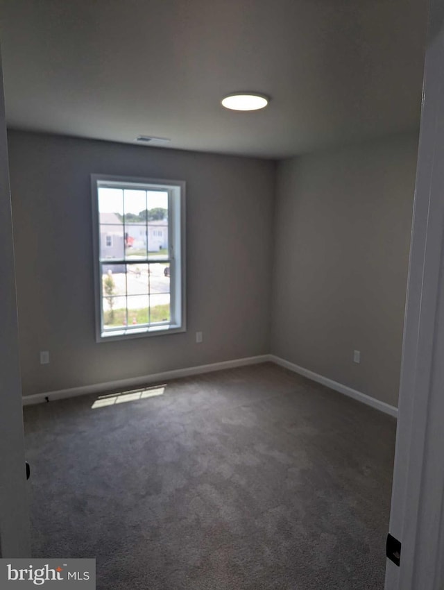 105 Fairfax Ln Unit 84, Dover, DE 19901 - unfurnished room with carpet flooring