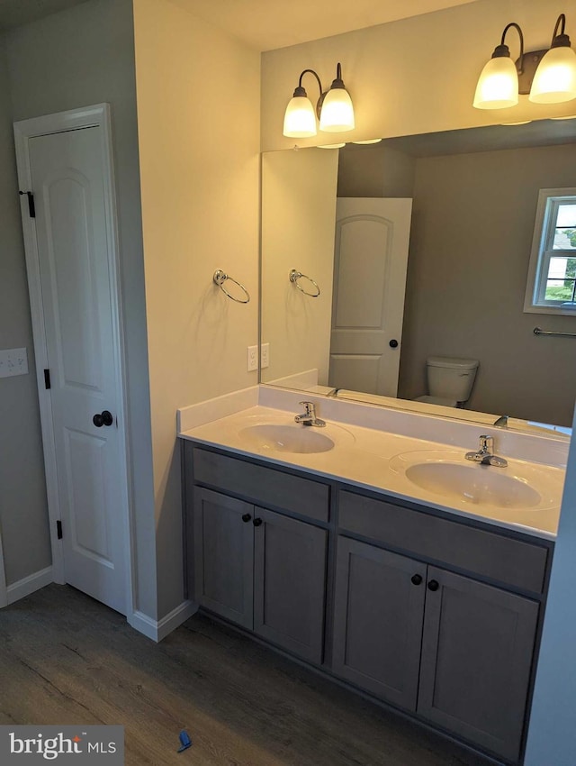 105 Fairfax Ln Unit 84, Dover, DE 19901 - full bathroom with wood finished floors and double vanity