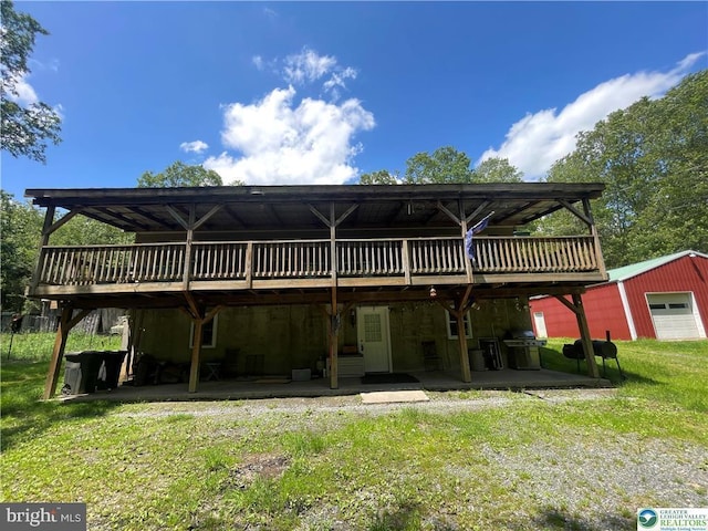 161 Quail Dr, Jim Thorpe, PA 18229 - rear view of property with a wooden deck, a yard, an outdoor structure, and a patio