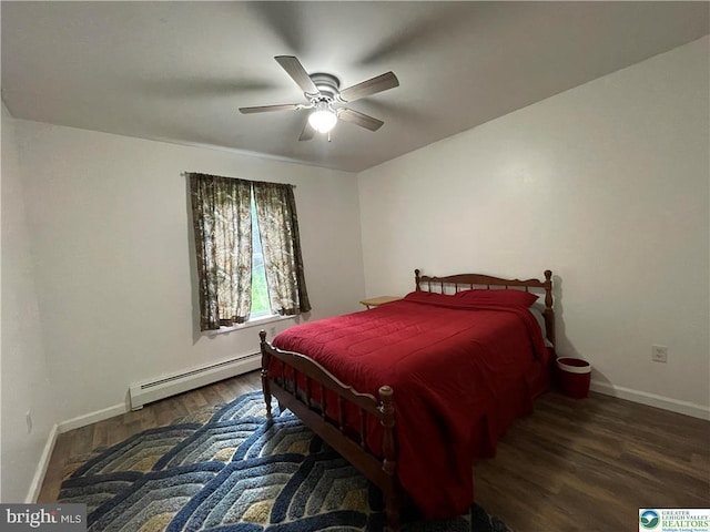 161 Quail Dr, Jim Thorpe, PA 18229 - bedroom featuring a baseboard heating unit, wood finished floors, and ceiling fan