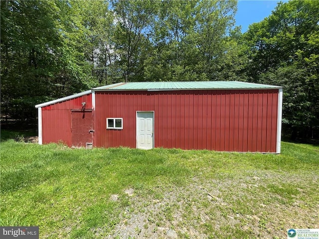 161 Quail Dr, Jim Thorpe, PA 18229 - view of pole building with a lawn and view of wooded area