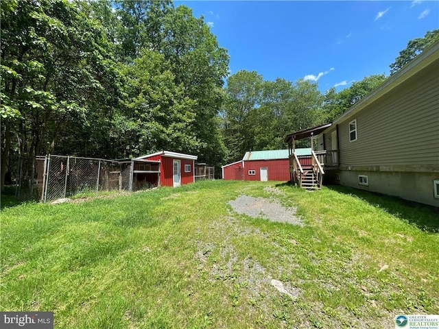 161 Quail Dr, Jim Thorpe, PA 18229 - view of yard featuring view of wooded area and a storage shed
