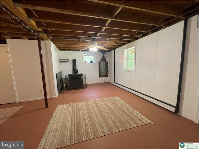 161 Quail Dr, Jim Thorpe, PA 18229 - below grade area with a wood stove and baseboard heating