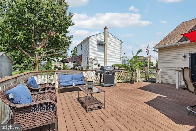 2640 E Colonial Dr, Upper Chichester, PA 19061 - wooden terrace with a grill and an outdoor hangout area