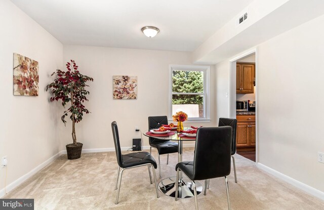 21317 Persimmon Dr, Chestertown, MD 21620 - dining space with light colored carpet and baseboards