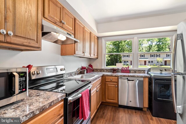 21317 Persimmon Dr, Chestertown, MD 21620 - kitchen featuring appliances with stainless steel finishes, under cabinet range hood, washer / clothes dryer, and healthy amount of natural light