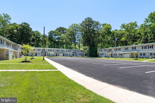 21317 Persimmon Dr, Chestertown, MD 21620 - uncovered parking lot featuring view of wooded area