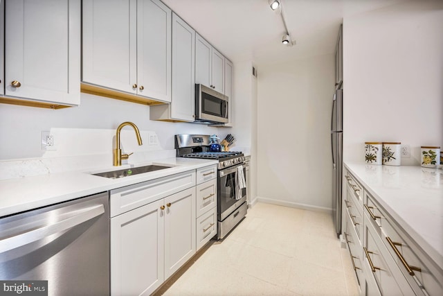 1280 21st St NW Unit 410, Washington, DC 20036 - kitchen with appliances with stainless steel finishes and a sink
