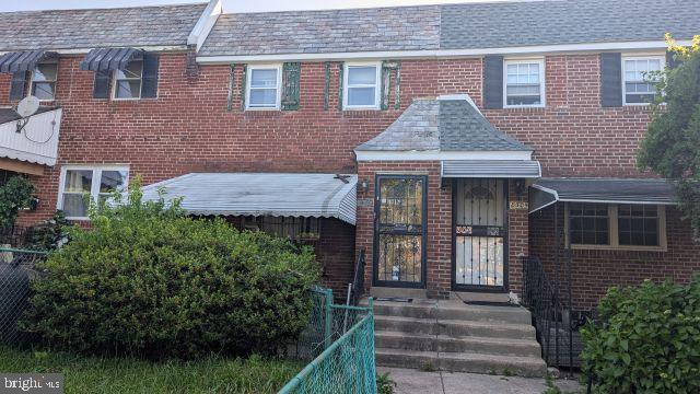 8307 Thouron Ave, Philadelphia, PA 19150 - view of front of property featuring brick siding