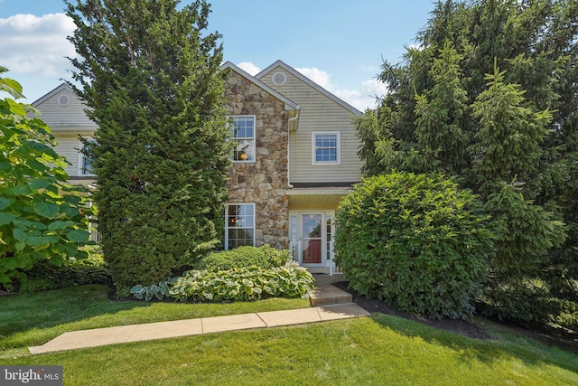 814 Amber Ln, West Chester, PA 19382 - view of front of house featuring stone siding and a front yard