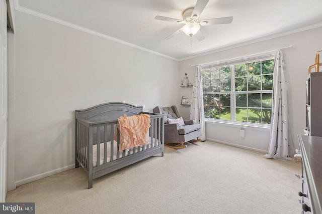 814 Amber Ln, West Chester, PA 19382 - bedroom featuring carpet floors, ornamental molding, a crib, and a ceiling fan