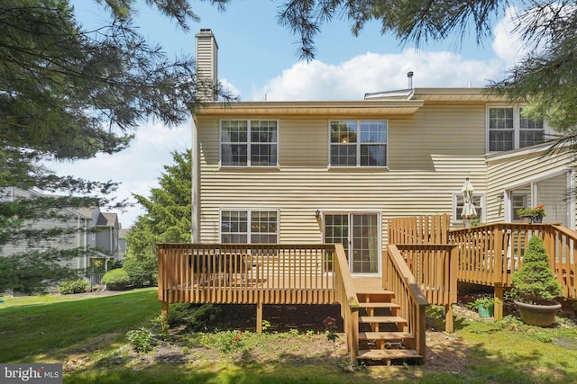 814 Amber Ln, West Chester, PA 19382 - rear view of property featuring a deck, a chimney, and a lawn