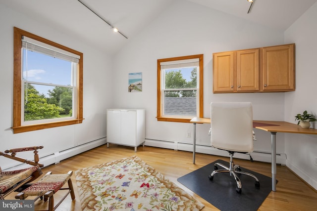 558 Skippack Pike, Blue Bell, PA 19422 - office area featuring lofted ceiling, light wood-style flooring, rail lighting, and a baseboard heating unit