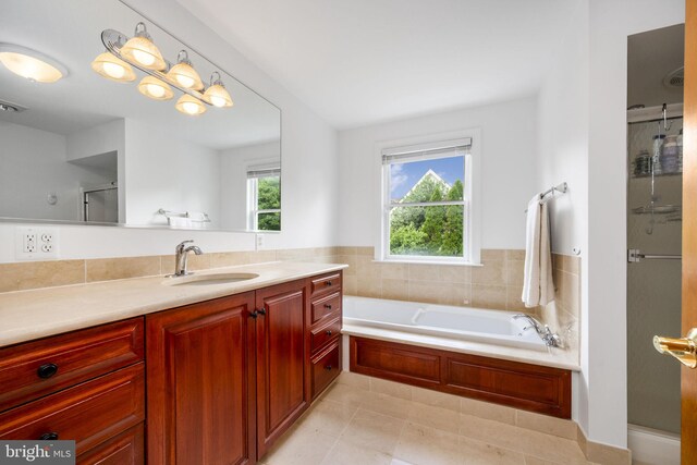 558 Skippack Pike, Blue Bell, PA 19422 - bathroom with vanity, a bath, a shower with door, and tile patterned flooring