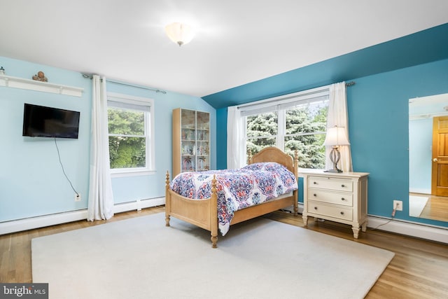 558 Skippack Pike, Blue Bell, PA 19422 - bedroom with wood finished floors and a baseboard heating unit