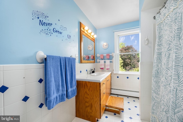 558 Skippack Pike, Blue Bell, PA 19422 - bathroom with baseboard heating, tile walls, vanity, wainscoting, and curtained shower