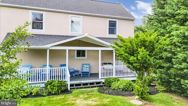 558 Skippack Pike, Blue Bell, PA 19422 - back of house featuring roof with shingles, stucco siding, and a yard
