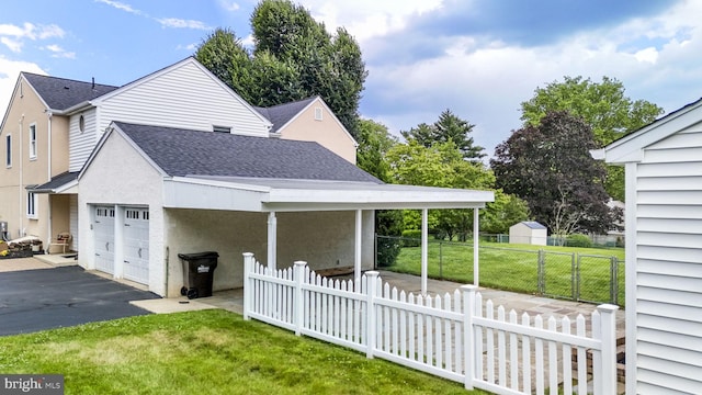 558 Skippack Pike, Blue Bell, PA 19422 - view of front facade featuring a shingled roof, an attached garage, and driveway