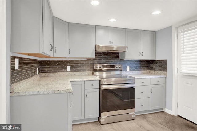 829-831 W Pine St, Coal Township, PA 17866 - kitchen featuring stainless steel electric range, gray cabinetry, under cabinet range hood, light wood-type flooring, and recessed lighting
