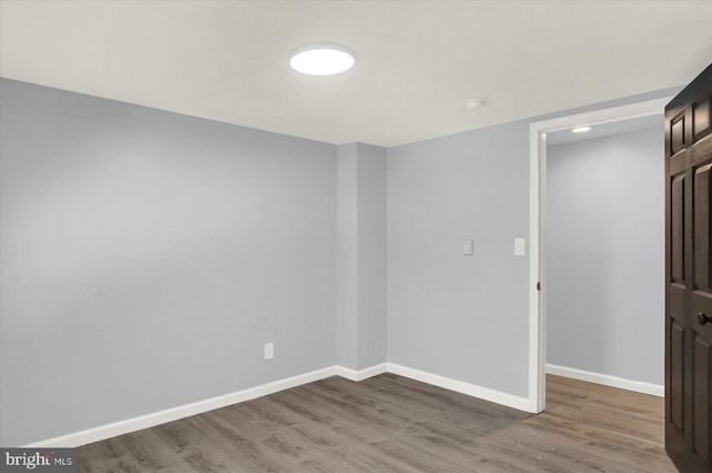 829-831 W Pine St, Coal Township, PA 17866 - spare room featuring wood finished floors and a smoke detector