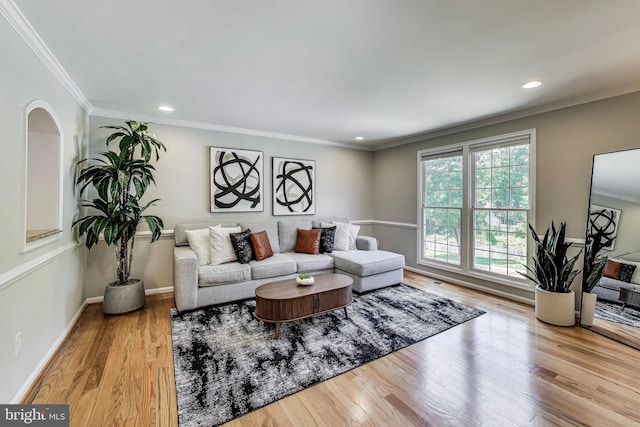 9009 Marie Ct, Lorton, VA 22079 - living area with wood finished floors, ornamental molding, recessed lighting, and arched walkways