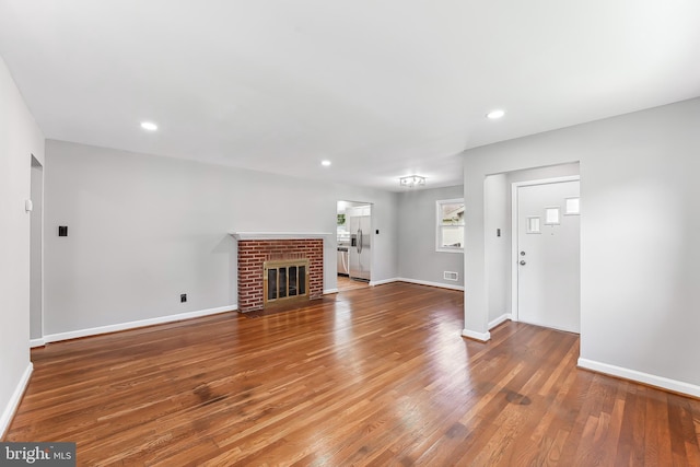 3834 Nancy Ave, Wilmington, DE 19808 - unfurnished living room featuring wood finished floors, recessed lighting, and a fireplace