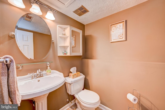 169 Independence Dr, Morrisville, PA 19067 - half bath with toilet and a textured ceiling