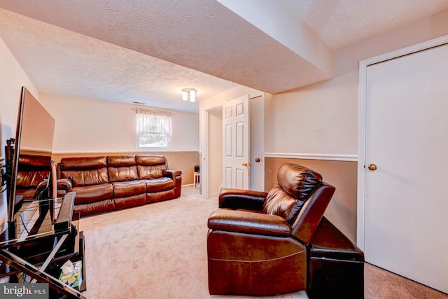 169 Independence Dr, Morrisville, PA 19067 - living room featuring carpet floors and a textured ceiling
