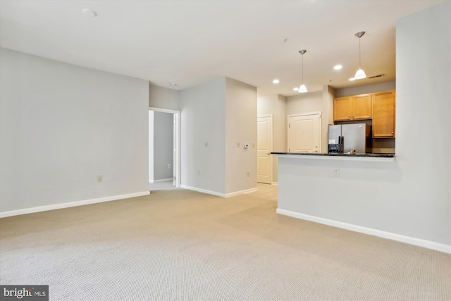 2655 Prosperity Ave Unit 100, Fairfax, VA 22031 - unfurnished living room with light carpet and recessed lighting