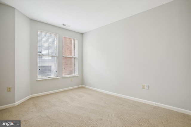 2655 Prosperity Ave Unit 100, Fairfax, VA 22031 - spare room featuring light colored carpet and baseboards