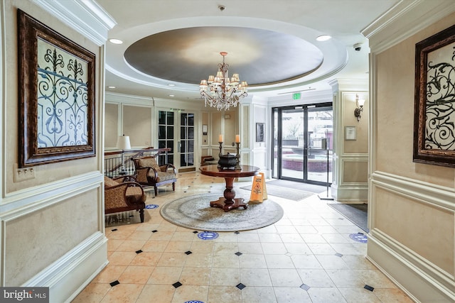 2655 Prosperity Ave Unit 100, Fairfax, VA 22031 - community lobby featuring ornamental molding, a security system, and recessed lighting