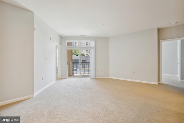 2655 Prosperity Ave Unit 100, Fairfax, VA 22031 - spare room with light carpet