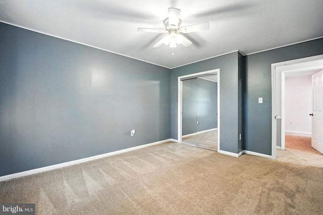 7491 Slagle Ln, Manassas, VA 20111 - unfurnished bedroom featuring carpet floors, a closet, and a ceiling fan