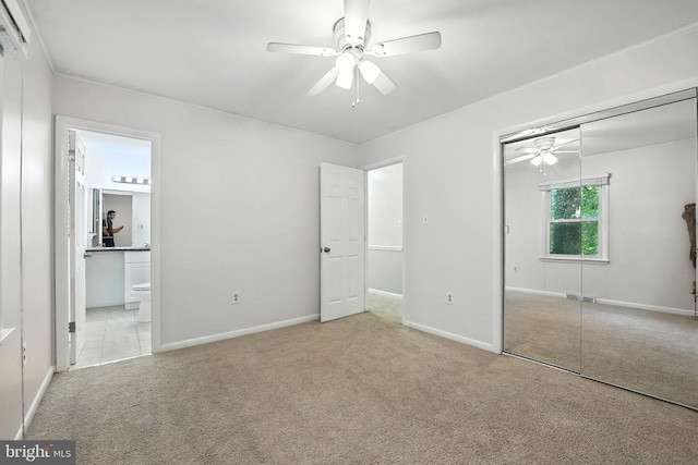 7491 Slagle Ln, Manassas, VA 20111 - unfurnished bedroom featuring a closet, carpet flooring, ensuite bath, and ceiling fan