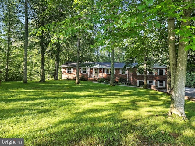 7491 Slagle Ln, Manassas, VA 20111 - view of front of home featuring a front yard and brick siding