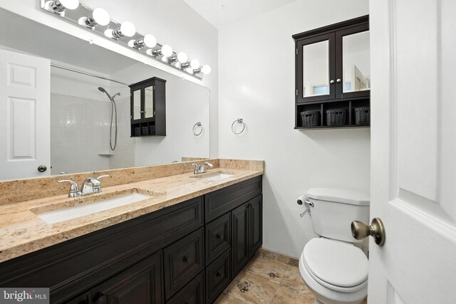 7491 Slagle Ln, Manassas, VA 20111 - bathroom featuring double vanity and a shower