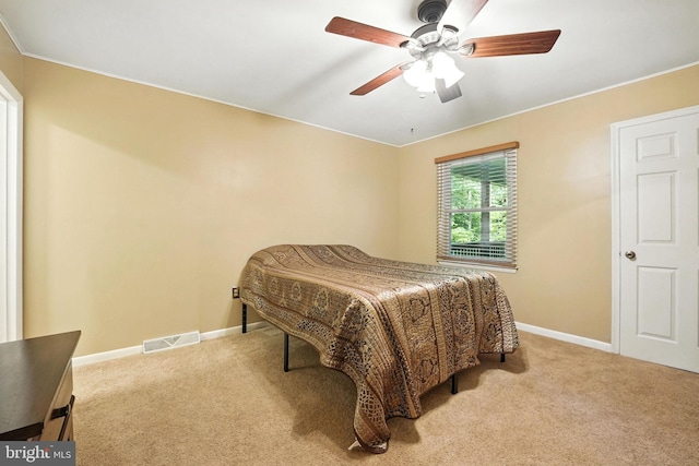 7491 Slagle Ln, Manassas, VA 20111 - carpeted bedroom with baseboards and ceiling fan