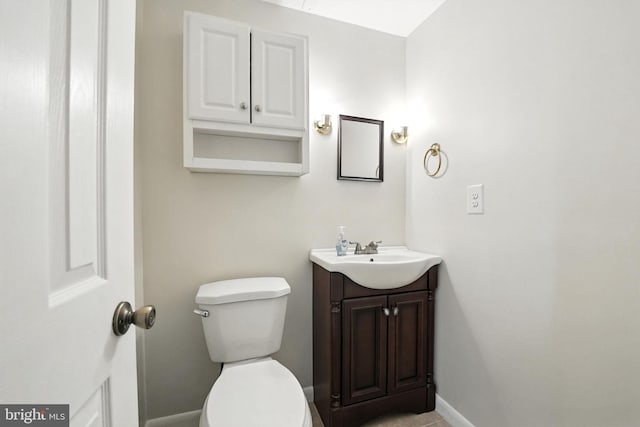 7491 Slagle Ln, Manassas, VA 20111 - half bath featuring vanity and baseboards