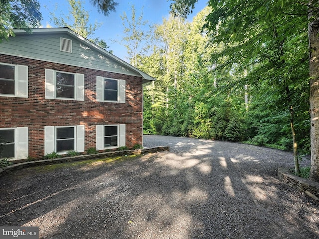 7491 Slagle Ln, Manassas, VA 20111 - view of property exterior with brick siding