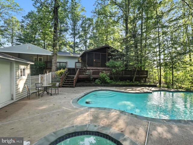 7491 Slagle Ln, Manassas, VA 20111 - outdoor pool featuring a wooden deck, stairs, a sunroom, and a patio area