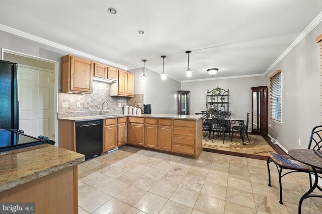 7491 Slagle Ln, Manassas, VA 20111 - kitchen with black appliances, a peninsula, backsplash, crown molding, and decorative light fixtures