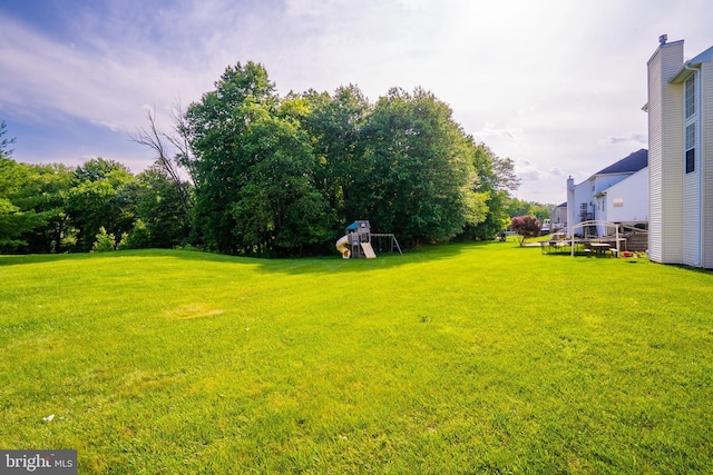 14 Stanley Dr, Monroe Township, NJ 08831 - view of green lawn with a playground