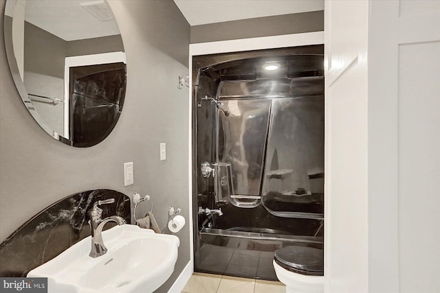 127 Spruce St, Middletown, PA 17057 - bathroom featuring tile patterned floors and shower / bath combination with glass door