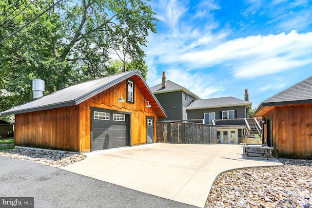 127 Spruce St, Middletown, PA 17057 - rustic home featuring a detached garage and an outbuilding