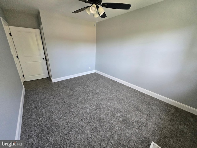 940 E 41st St, Baltimore, MD 21218 - unfurnished room with a ceiling fan and dark carpet