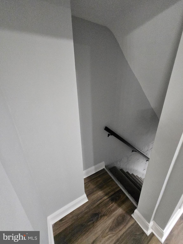 940 E 41st St, Baltimore, MD 21218 - stairs with wood finished floors and lofted ceiling