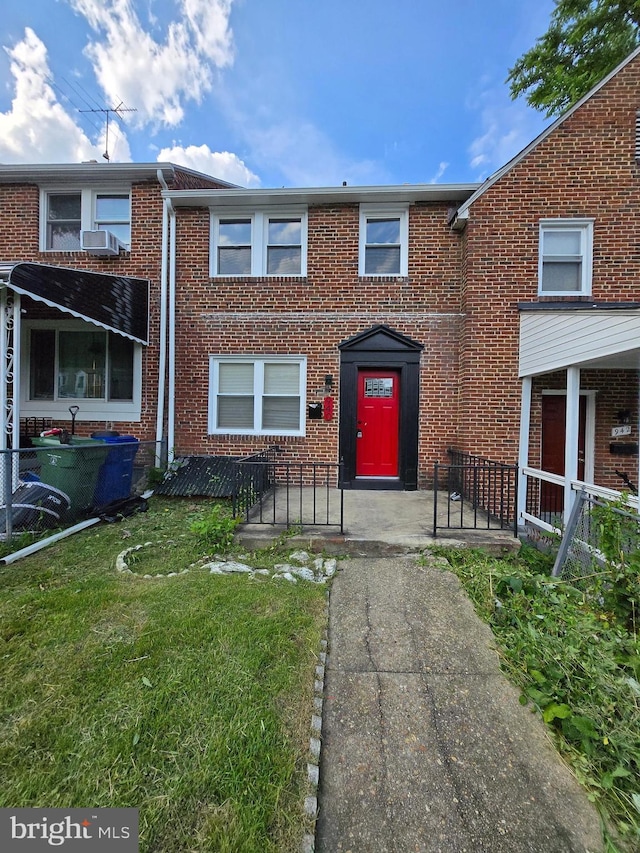 940 E 41st St, Baltimore, MD 21218 - view of property featuring brick siding