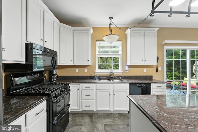28 White Birch Blvd, Bear, DE 19701 - kitchen featuring black appliances, healthy amount of natural light, white cabinets, dark stone counters, and ornamental molding