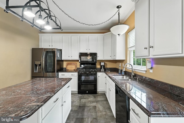 28 White Birch Blvd, Bear, DE 19701 - kitchen with black appliances, white cabinetry, and decorative light fixtures